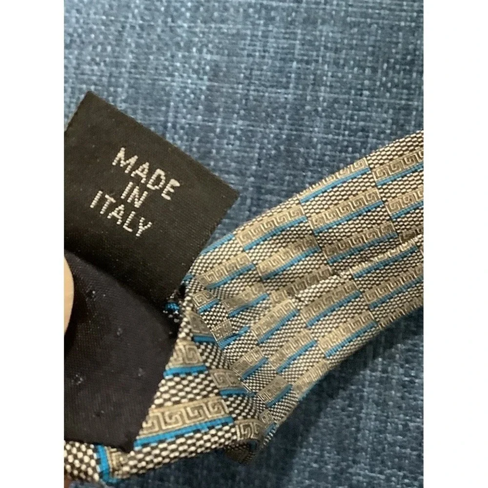 Men's tie by Gianni Versace. 100% Silk.